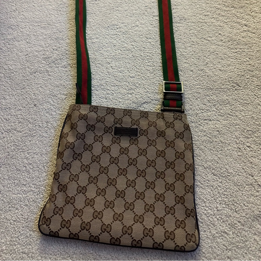 Gucci authentic crossbody canvas bag/tote.  Very good condition.